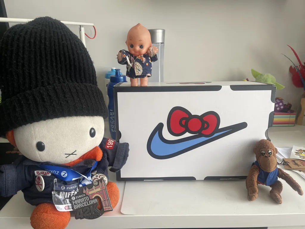 Miffa Kewpie and Gutang pose with the Hello Kitty Nike Air Presto